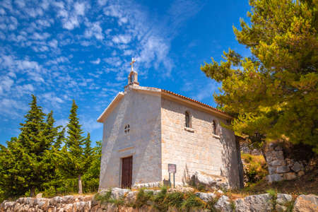 Church of St. Fabjana above of the Podstrana village on the Adriatic Sea, near Split town, Croatia, Europe.の写真素材