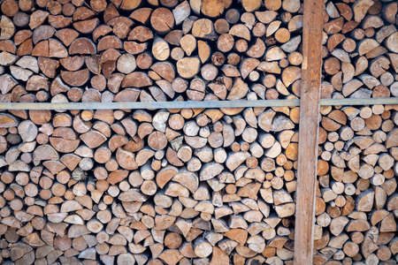 Chopped wood stored for heating in the winter season.