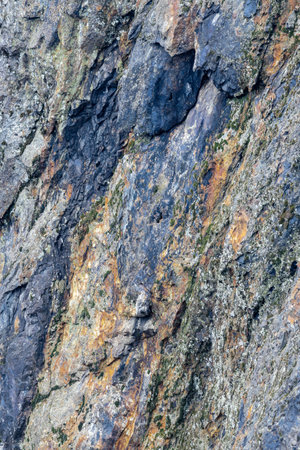 Colorfull stone wall containing minerals.の写真素材