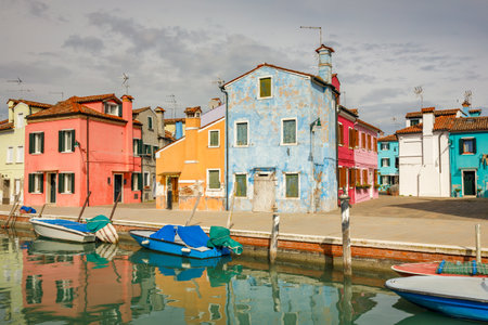 The Burano island near Venice, a canal with colorful houses, Italy, Europe.の写真素材