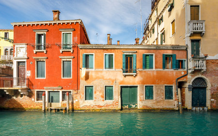 The canal with historic buildings in Venice, Italy, Europe.の写真素材