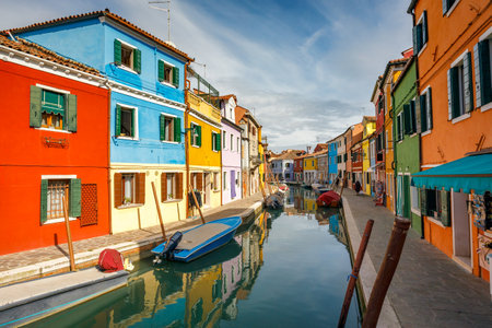 The Burano island near Venice, a canal between colorful houses, Italy, Europe.の写真素材