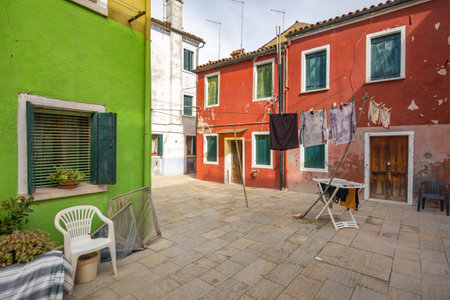 Colorful houses on The Burano island near Venice, Italy, Europe.の写真素材
