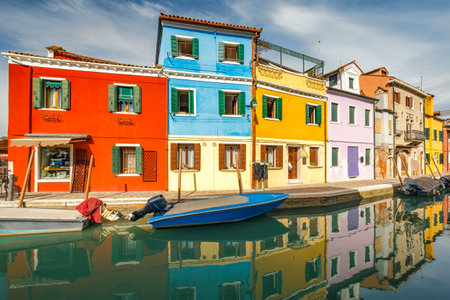 The Burano island near Venice, a canal with colorful houses, Italy, Europe.の写真素材