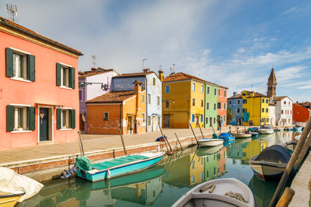 The Burano island near Venice, a canal with colorful houses, Italy, Europe.の写真素材