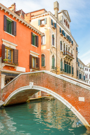 Stone bridge over the canal in Venice, Italy, Europe.の写真素材