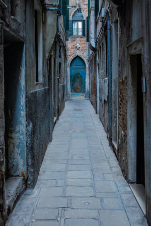 Narrow street in the historical center of Venice, Italy, Europe.の写真素材