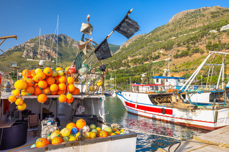 CASTELLAMMARE DEL GOLFO, ITALY - JULY 15, 2023: Harbor with fishing boats in the morning.のeditorial素材
