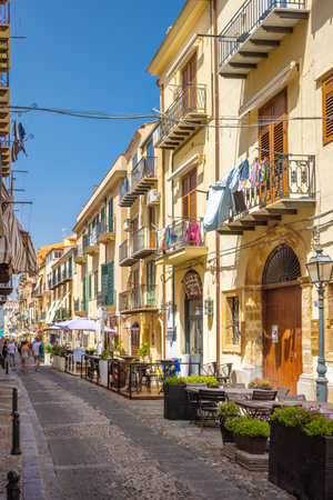 CEFALU, ITALY - JULY 16, 2023: Street at center of town, an attractive destination in Sicily.のeditorial素材