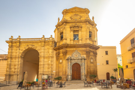 MARSALA, ITALY - JULY 8, 2023: The Garibaldi Gate with The Addolorata church, entrance in historic center of town.のeditorial素材