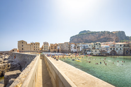 CEFALU, ITALY - JULY 16, 2023: city beach in an attractive destination in Sicily.のeditorial素材