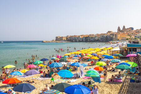 CEFALU, ITALY - JULY 16, 2023: city beach in an attractive destination in Sicily.のeditorial素材