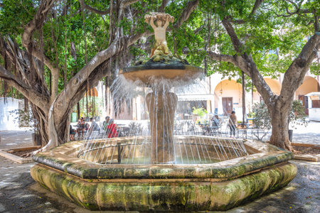 MARSALA, ITALY - JULY 8, 2023: Fountain in center of town in southwestern of Sicily.のeditorial素材