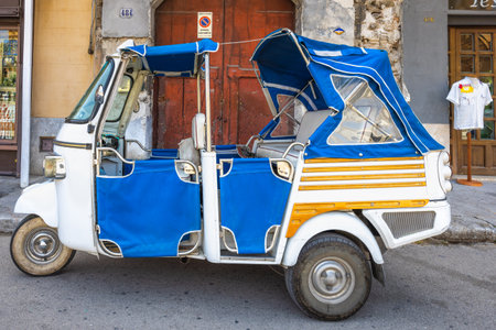 PALERMO, ITALY - JULY 18, 2023: Three-wheeled car on the street.のeditorial素材