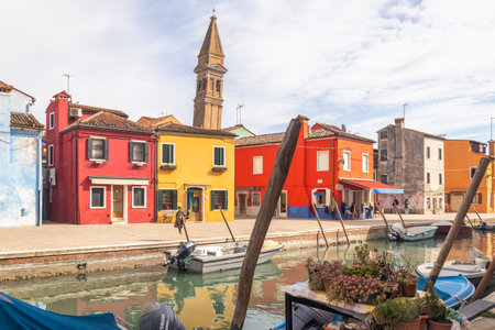 BURANO, ITALY - MARCH 3, 2023: The island near Venice with a canals between colorful houses.のeditorial素材