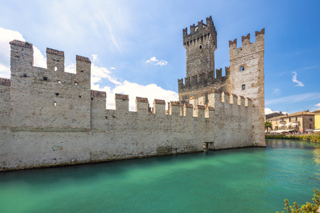 The walls of the Scaligero Castle on Lake Garda in the historical center of Sirmione, Italy, Europe.の写真素材