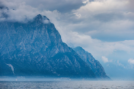 Mountains with a body of water in the foreground.の写真素材