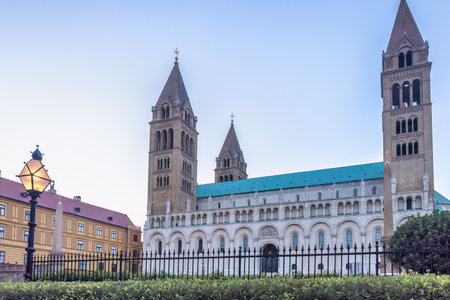 Cathedral in Pecs town in Hungary, Europe. Cathedral featuring multiple towers, elegant architectural details and a serene sky backdrop.の写真素材