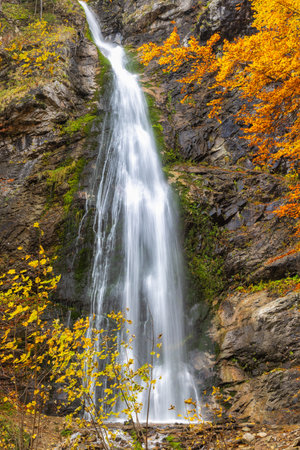 The Sutovsky waterfall in The Mala Fatra national park in Slovakia, Europe. Autumnal Waterfall:...