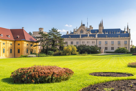 Lednice, Czech Republic - October 12, 2024: The Lednice castle. Grand architecture meets tranquil landscape in a European estate, idyllic setting blending history and natural beauty on a sunny day.のeditorial素材