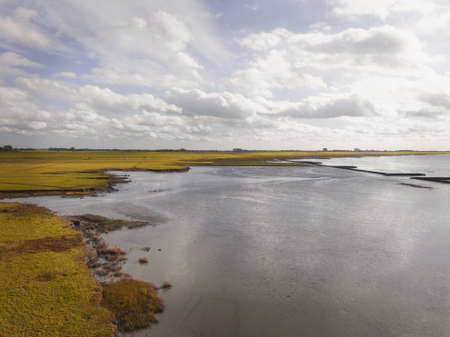 Landscape at the sea from above. Drone flight over the ocean. Beautiful waterside and sky