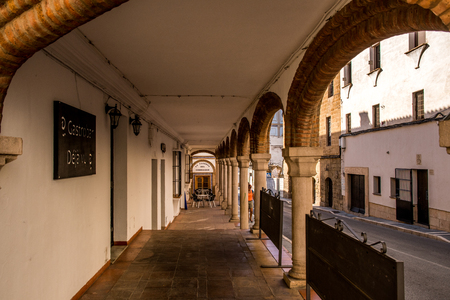 RONDA, ANDALUSIA / SPAIN - OCTOBER 08 2017: COLONNADE ON PEDESTRIAN SIDEWALKのeditorial素材