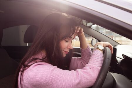 the migraine in a girl in an atomobileの写真素材