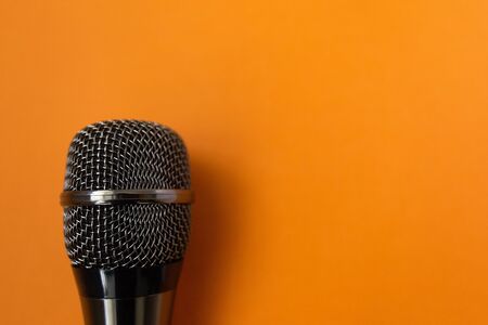 Musical microphone on an orange
