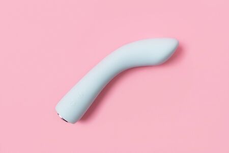 on a pink background sex product, a toy for adultsの写真素材