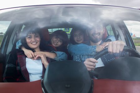 the Happy family in the car, travelの写真素材