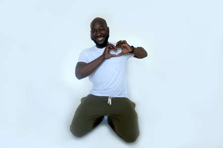 the African American shows gesture with his heartの写真素材