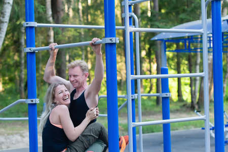the Happy couple play sports on the street