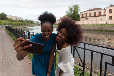 the Happy African American women take a selfieの写真素材
