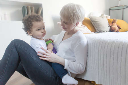 the mom with young son at home, talking
