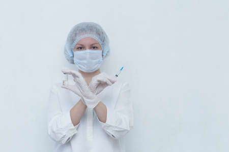nurse with a vaccine on a white background