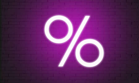 neon tag with discount on the background of a brick wall.の写真素材