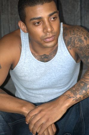 Portrait of a black man with tattoosの写真素材