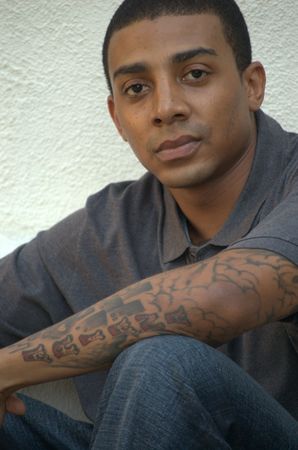 Portrait of a black man with tattoosの写真素材