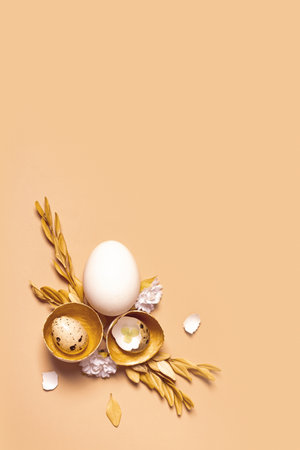Monochrome flat lay Easter eggs composition decoration with twigs and flowers. Easter still life...