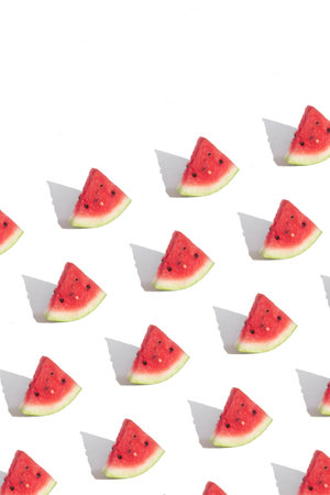 Pattern with watermelon slices isolated on pink.Abstract summer background. vertical format.の写真素材