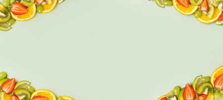 Citrus fruits, kiwi and strawberries flat lay, top view. Summer  banner background with copy space.の写真素材