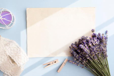Blank sheet on top of the table lavender, candle, laceの写真素材