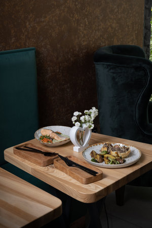 The table is served with the main dishes in the restaurant.の写真素材