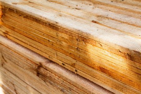 Stack of wooden studs in a sawmill, close-upの写真素材