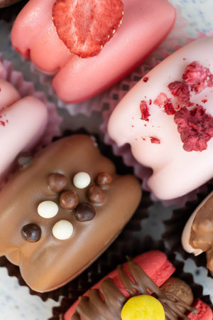 Colored macaroons with decoration for those with a sweet tooth close up