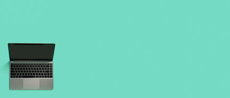 Top view of modern laptop isolated on colored background. Copy space.