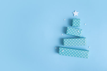 Blank greeting card with abstract Christmas tree made of gift boxes for Merry Christmas and Happy New Yearの写真素材
