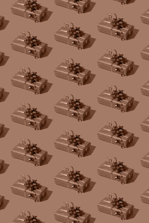 Pattern made from gift boxes mocha mousse trendy new year colourの写真素材