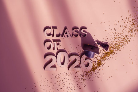 Class of 2026 concept Wooden number 2026 with graduate hat on colored background.