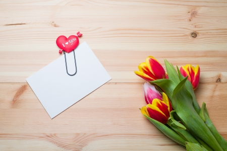 Image of tulips with blank noteの写真素材